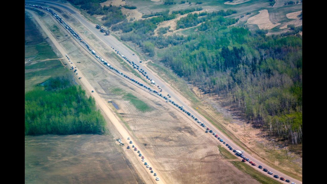 Traffic is at a standstill on Highway 63 south as residents flee the wildfire on May 4.