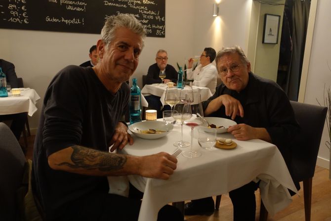 Bourdain and musician Irmin Schmidt, a founding member of the band CAN, finish a five-course tasting menu at Ox & Klee.