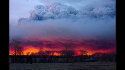 A wildfire moves towards the town of Anzac from Fort McMurray, Alberta., on Wednesday May 4, 2016.