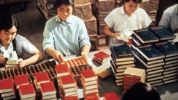 Employees of the Government Printing House pack in 1971 in Bejing copies of Mao Zedong's "Little Red Book," the bible of the Maoism, teaching the philosophy of Mao -- a revolutionary ideology based on Marxism-Leninism adapted to Chinese conditions. Maoism shifted the focus of revolutionary struggle from the urban workers or proletariat to the countryside and the peasantry. Mao, who was Chairman of the Chinese Communist Party (CCP) from 1935 until his death in 1976, launched in 1966 the "Great Proletarian Cultural Revolution", directed against those CCP "party leaders taking the capitalist road". Mao's shock troops were to be the Red Guards, principally middle-school and university students who were to draw inspiration from Mao himself-now supreme authority in all matters.   CHINA OUT        (Photo credit should read STR/AFP/Getty Images)