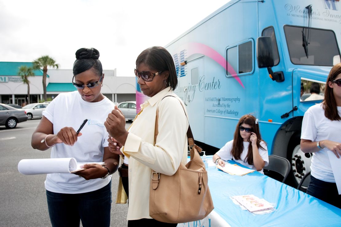 Andrea Ivory, left, and her nonprofit provide community wellness and screening events to women in three Florida counties.