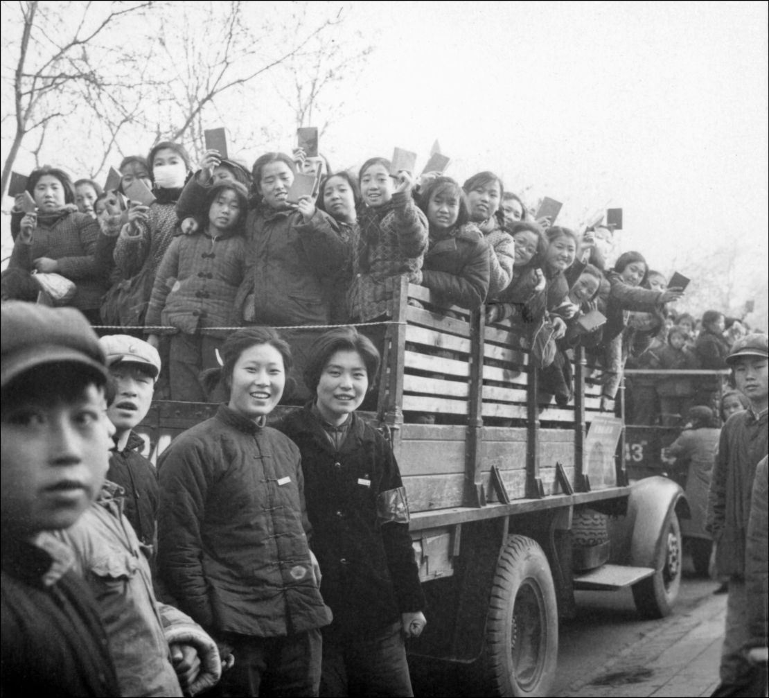 The Red Guards, high school and university students, brandishing the copies of Chairman Mao Zedong's "Little Red Book" in Beijing in 1966.