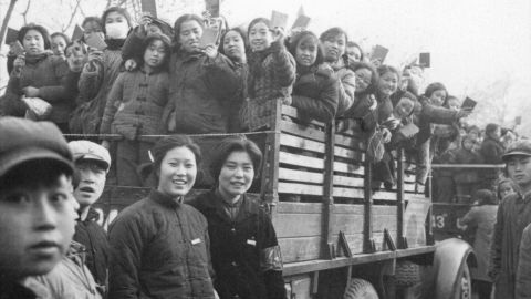 The Red Guards, high school and university students, brandishing the copies of Chairman Mao Zedong's "Little Red Book" in Beijing in 1966.