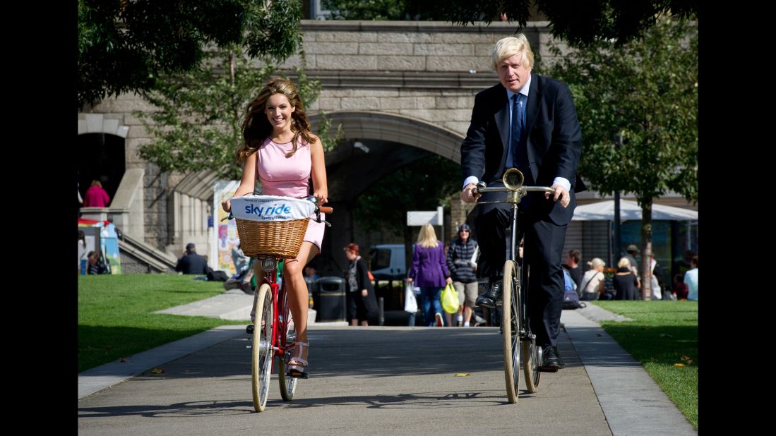 Johnson and model Kelly Brook launch a cycling festival in London on August 25, 2011.