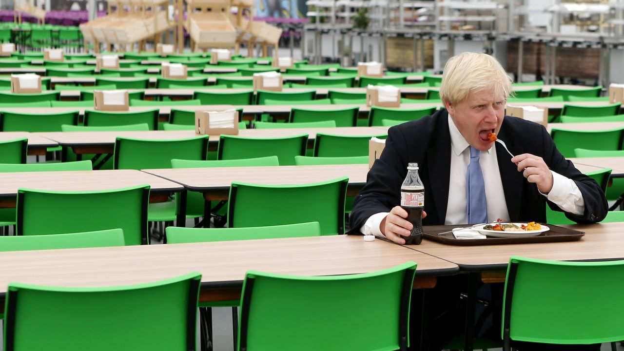 Johnson eats in the Olympic Village in London on July 12, 2012.