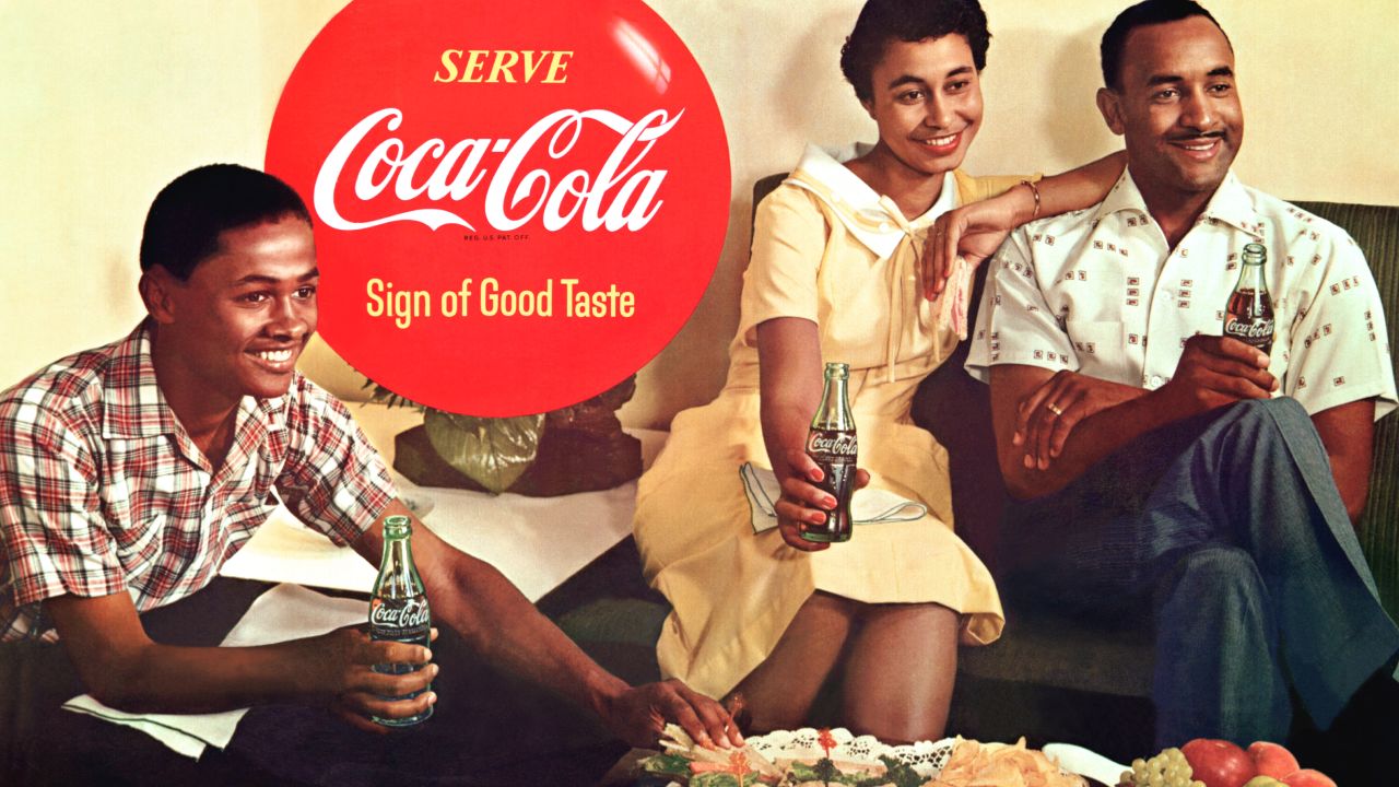 <strong>1957:</strong> Mary Alexander was the first African-American woman to appear in Coca-Cola advertising. She appeared in about 15 Coca-Cola print ads throughout the 1950s.