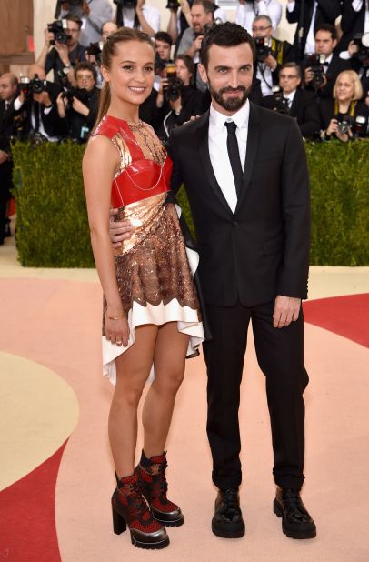 Nicolas Ghesquire with actress and Louis Vuitton spokesperson Alicia Vikander --wearing Louis Vuitton -- at the 2016 Met Gala.