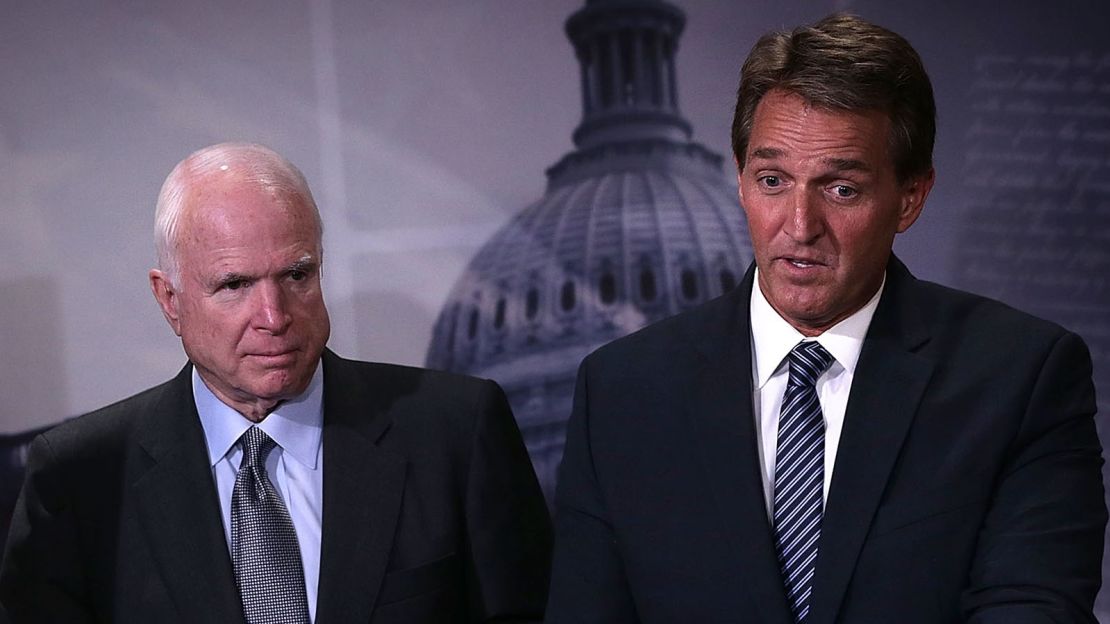 Sen. John McCain (R-AZ) and Sen. Jeff Flake (R-AZ) speak to members of the media during a news conference November 4, 2015 on Capitol Hill in Washington, DC.