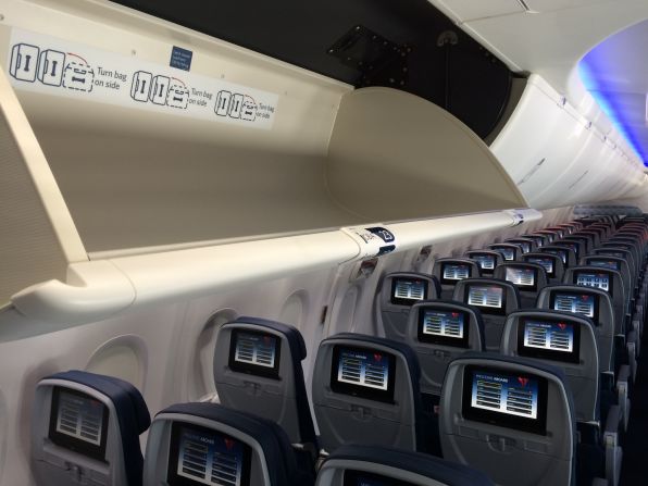 Delta's new cabins inside its Boeing 737-900ERs will be outfitted with full spectrum LED ambient lighting, seat-back in-flight entertainment systems and large overhead bins rated to 130 pounds. 