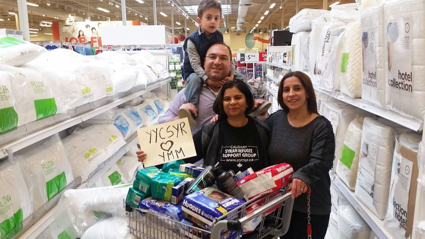 Members of the Syrian Refugee Support Group in Calgary, Alberta, are buying supplies for wildfire evacuees. 