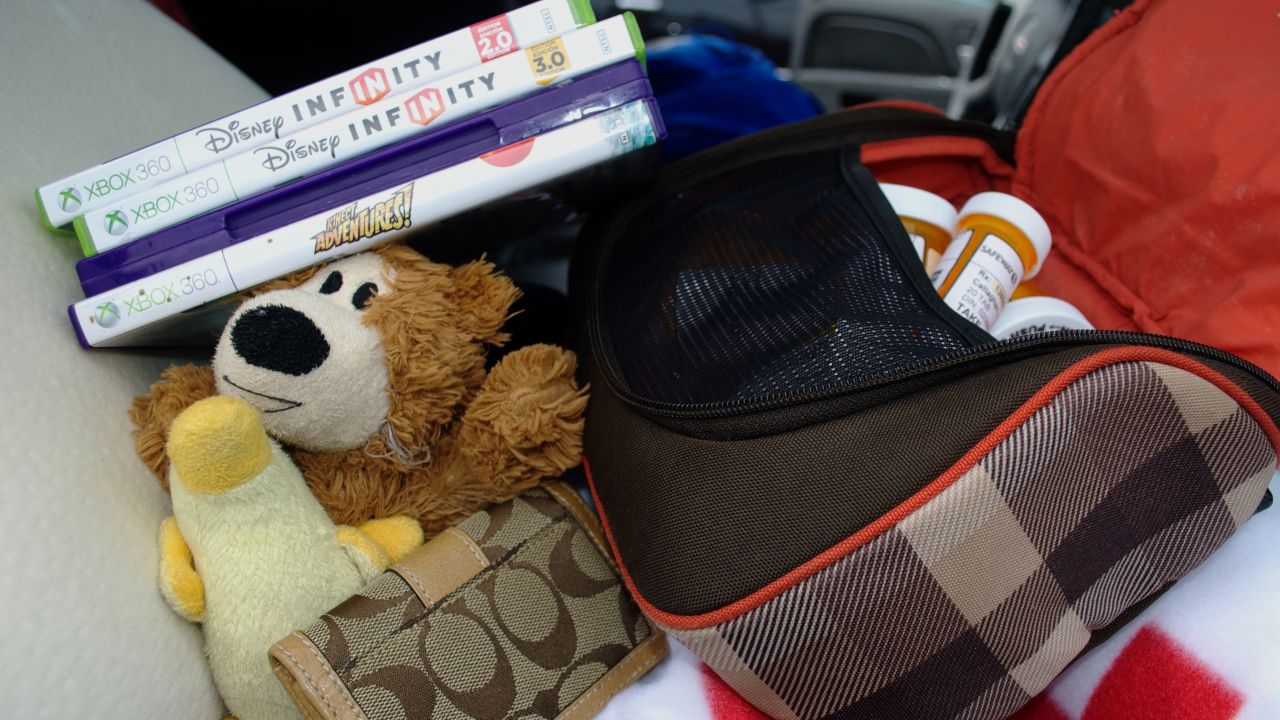 Mary Callaghan took her medicine, jewelry, toys for a dog and games for her grandson before fleeing.