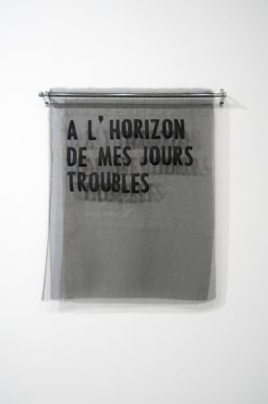 A L'Horizon de Mes Jours Troubles, 2015, by Joël Andrianomearisoa. The Madagascan born photographer works in various mediums, from video to performance and sculpture -- the only unifying theme being his use of black as a color. "I need to be surprised by images. The situation has to be completely staggered. I do not consider myself as a photographer; I am someone who makes images", he says.