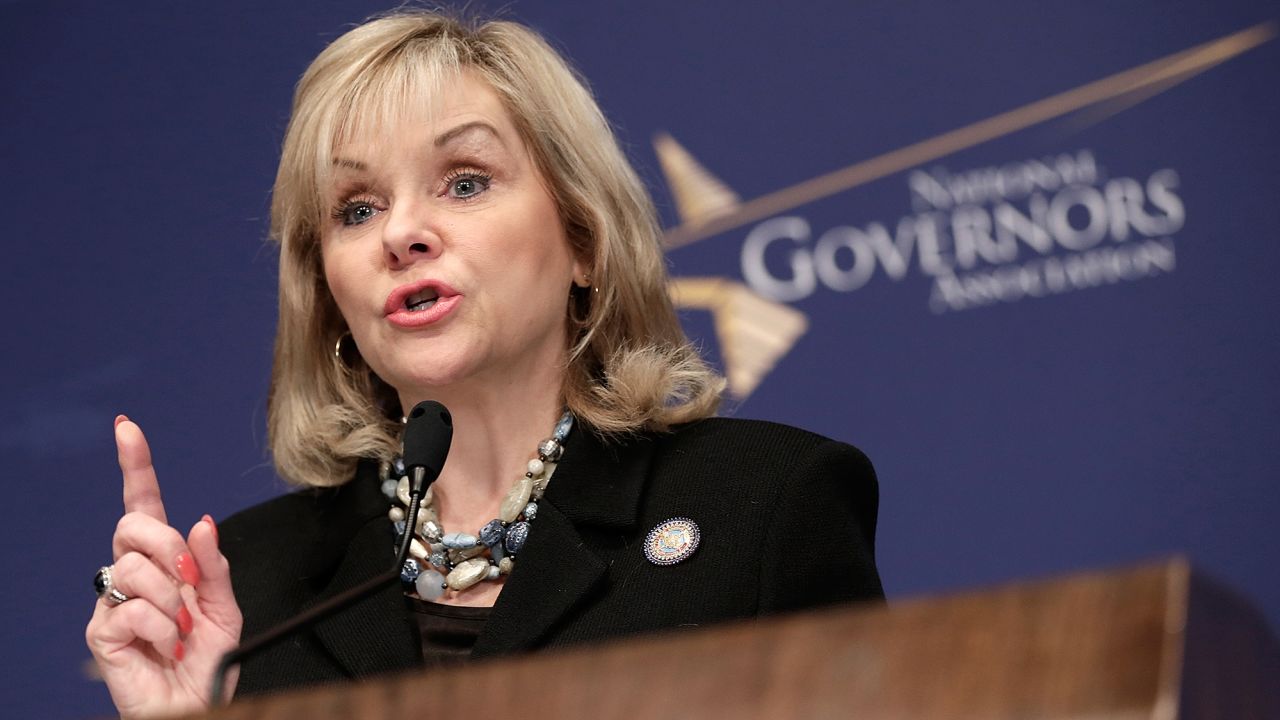 Gov. Mary Fallin, shown at the National Press Club in January 2014, says the law will not restrict people who want to adopt. 