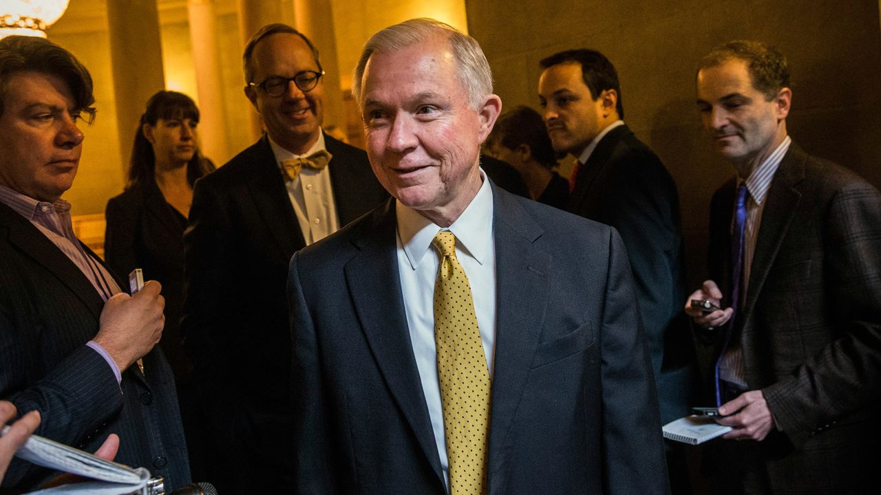 Sen. Jeff Sessions answers questions as he arrives for a meeting of Senate Republicans on a solution for the pending budget and debt limit impasse at the U.S. Capitol October 16, 2013.