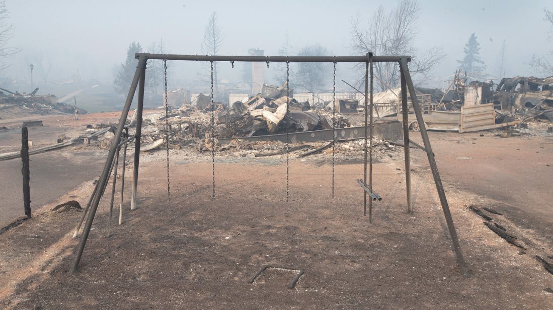 The remains of a swing sits in a residential neighborhood destroyed by the fire on May 6 in Fort McMurray.
