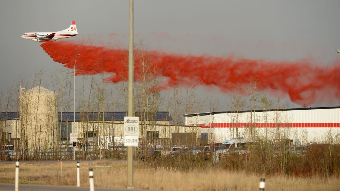 A plane drops fire retardant in Fort McMurray on May 6.