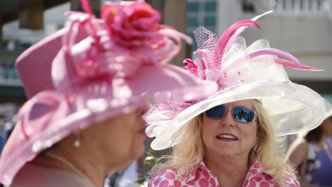 Advice from the Kentucky Derby: If your hat is having a pattern party, keep the dress design simple.