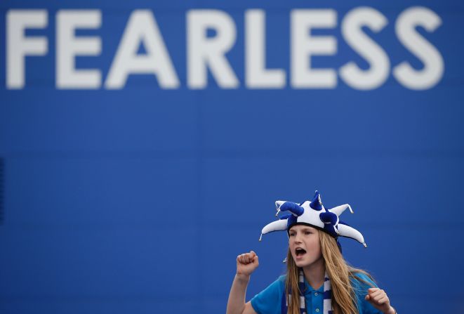 A Leicester fan sings before entering the King Power Stadium Saturday.