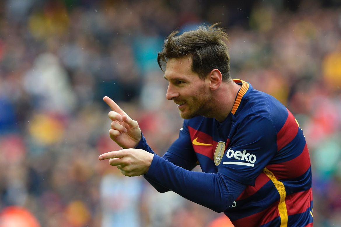 Barcelona's Argentinian forward Lionel Messi celebrates after scoring against Espanyol in the team's penultimate match of the season. 