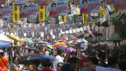 Filipinos troop to polling centers to vote in suburban Manila, Philippines Monday, May 9, 2016. Millions of Filipinos trooped to elections centers Monday to pick a new president, vice president and thousands of other officials amid tight security across the country. (AP Photo/Lino Escandor II)