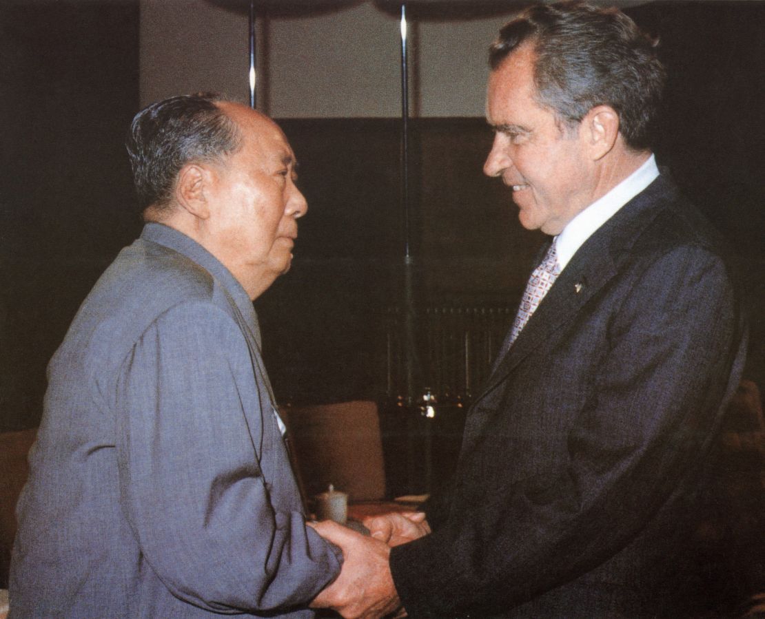 Chinese communist leader Chairman Mao Zedong welcomes US President Richard Nixon at his house in Beijing during Nixon's historic trip to China in 1972.