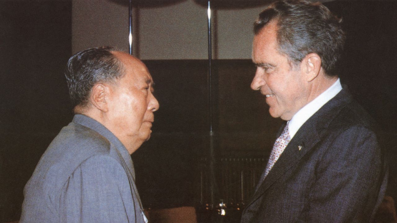 Chinese communist leader Chairman Mao Zedong welcomes US President Richard Nixon at his house in Beijing during Nixon's historic trip to China in 1972.