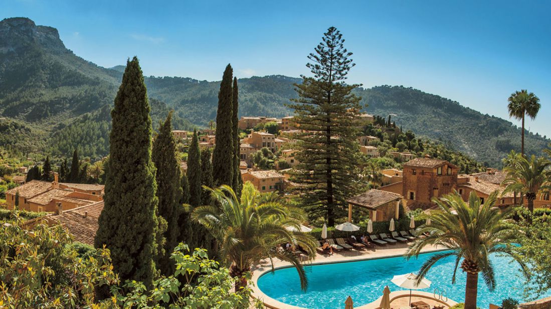 Made up of several 16th-century farmhouses, Belmond La Residencia's 67 rooms are decorated in traditional Mallorcan style with terracotta tile floors and canopied, hand-carved beds.<br />
