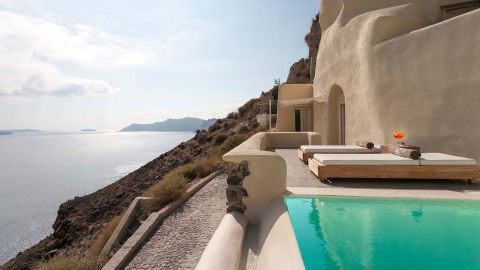 Pool with a panorama: Santorini's Mystique.