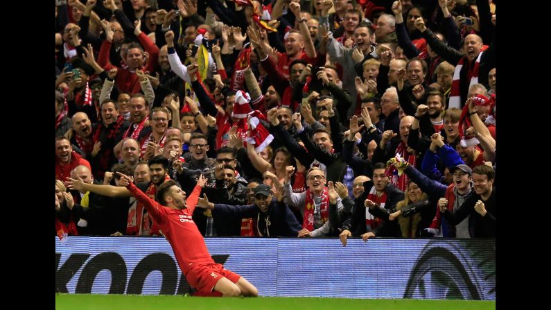 Liverpool's Adam Lallana celebrates in front of his home fans after scoring a goal during the Europa League semifinal against Villarreal on Thursday, May 5. The English club won 3-0 to advance to the final against Sevilla. <a href="index.php?page=&url=http%3A%2F%2Fedition.cnn.com%2F2016%2F05%2F05%2Ffootball%2Fliverpool-europa-league-villarreal-klopp%2F">READ MORE: Liverpool overpowers Villarreal</a>