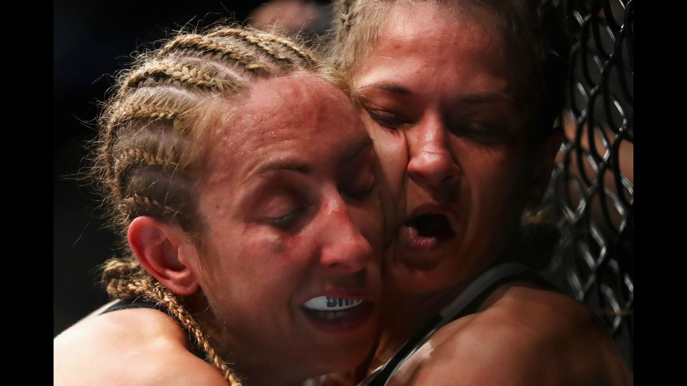 Heather Jo Clark, left, and Karolina Kowalkiewicz compete during a UFC event in Rotterdam, Netherlands, on Sunday, May 8. Kowalkiewicz won by unanimous decision.