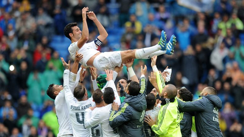 Alvaro Arbeloa is thrown into the air by his Real Madrid teammates after playing his last home match for the club on Sunday, May 8. The defender's contract is expiring at the end of the season. <a href="index.php?page=&url=http%3A%2F%2Fedition.cnn.com%2F2016%2F05%2F08%2Ffootball%2Fla-liga-barcelona-real-madrid-atletico-madrid%2Findex.html">READ MORE: Barca one win away from title</a>