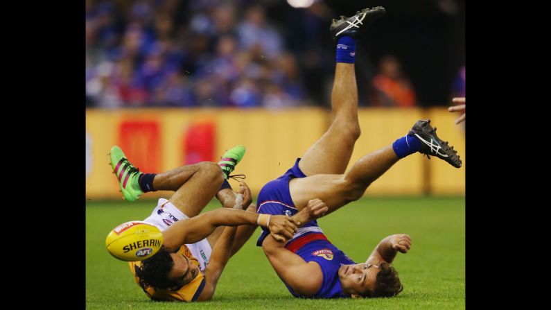 Eddie Betts of the Adelaide Crows, left, competes with Luke Dahlhaus of the Western Bulldogs during an Australian Football League match in Melbourne on Saturday, May 7.