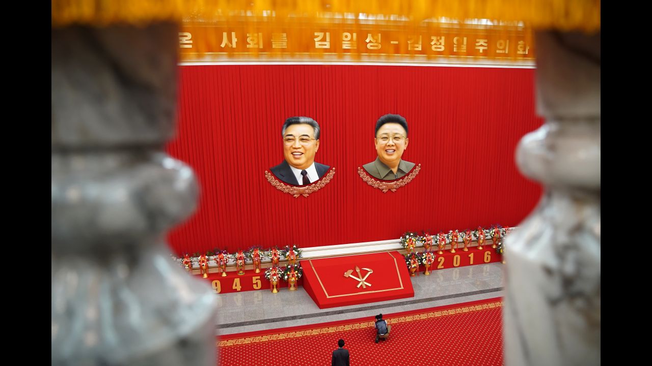 The images of former North Korean leaders Kim Il Sung (left) and Kim Jong Il adorn the convention center as the 7th Workers' Party Congress in Pyongyang takes place. 