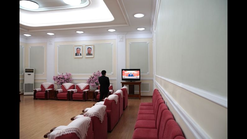 A man watches the 7th Workers' Party Congress in Pyongyang, where North Korean leader Kim Jong Un gave a 15-minute opening speech, touting the country's weapons development.