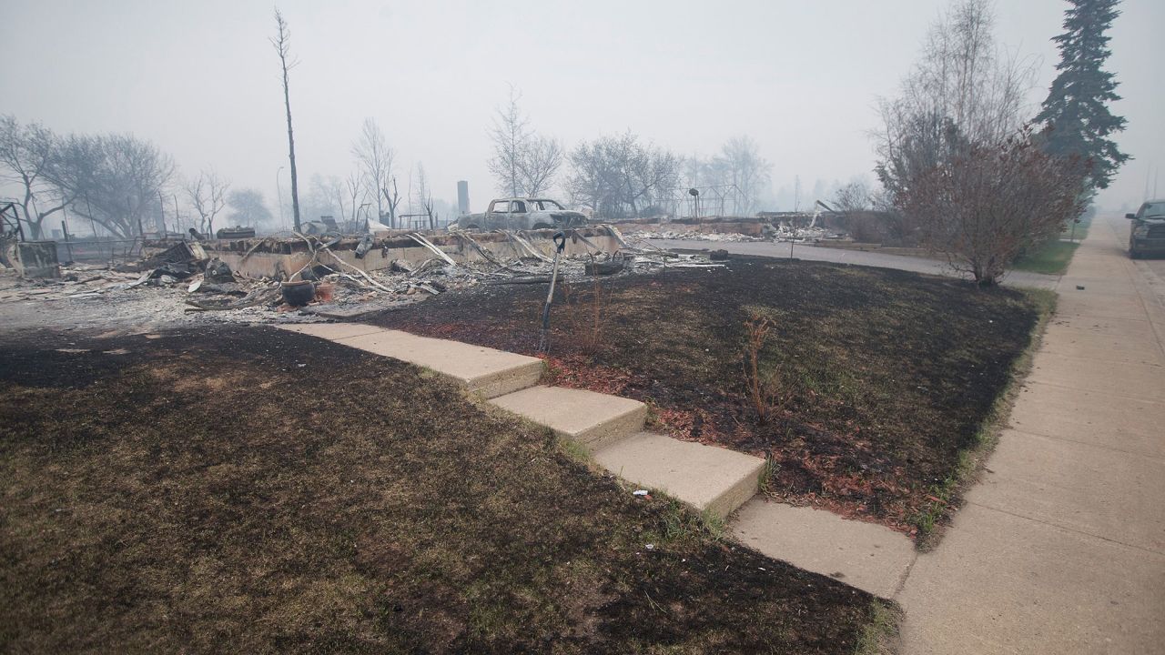 Foundations of homes are all that remain in parts of a residential neighborhood in Fort McMurray on May 7.