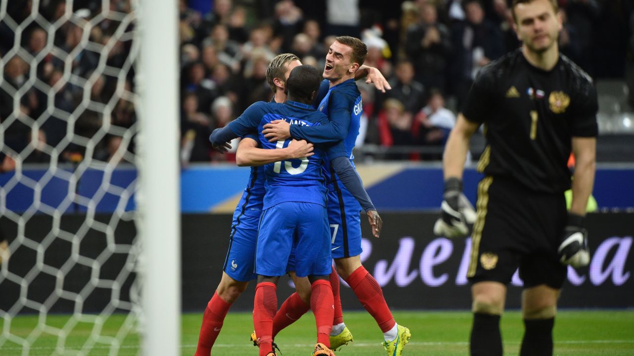 N'Golo Kante (center) celebrates a debut France goal on his 25th birthday.