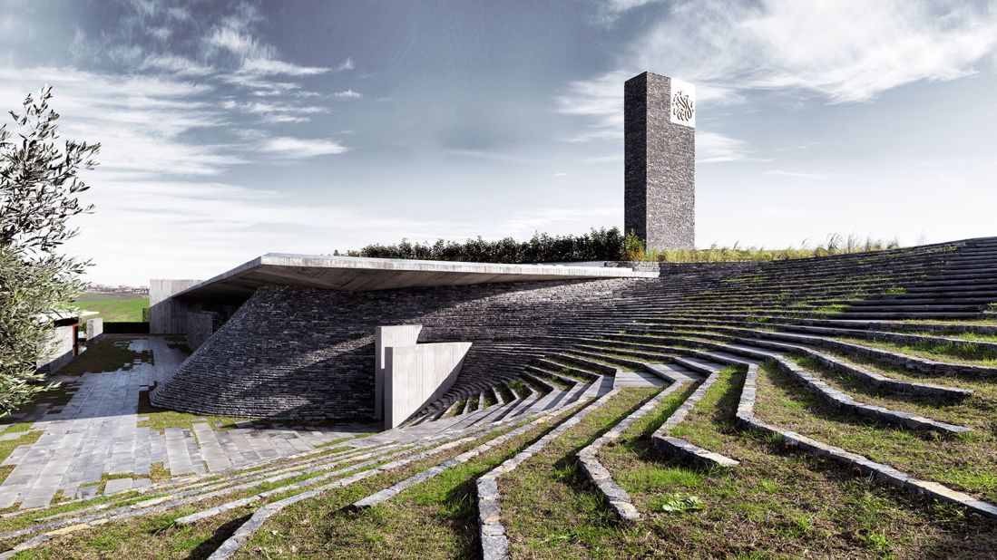 Completed in 2012 in Büyükçekmece, a suburb of Istanbul, this mosque is built of rough stone and concrete and, set in a hollow, is reached by stepping-stones across a pool.