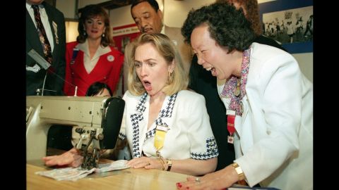 In June 1992, Clinton uses a sewing machine designed to eliminate back and wrist strain. She had just given a speech at a convention of the International Ladies' Garment Workers Union.