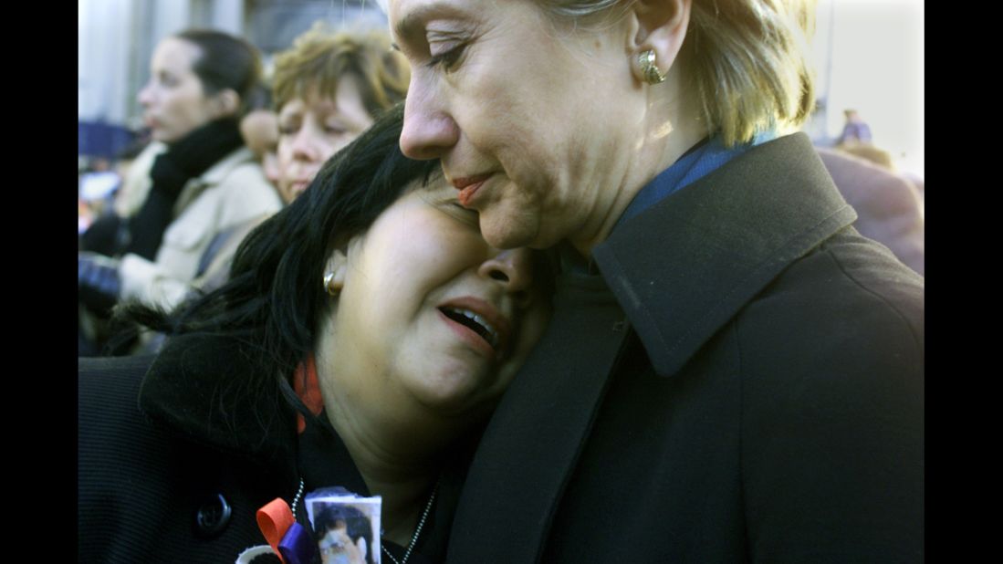 Sen. Clinton comforts Maren Sarkarat, a woman who lost her husband in the September 11 terrorist attacks, during a ground-zero memorial in October 2001.