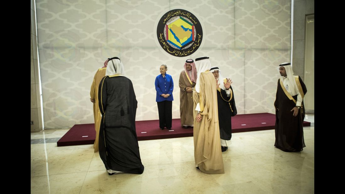 Clinton arrives for a group photo before a forum with the Gulf Cooperation Council in March 2012. The forum was held in Riyadh, Saudi Arabia.