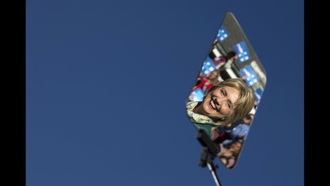 Clinton is reflected in a teleprompter during a campaign rally in Alexandria, Virginia, in October 2015.