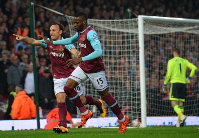 Senegalese striker Diafra Sakho celebrates with Mark Noble after putting West Ham ahead in the 10th minute of Tuesday's match.