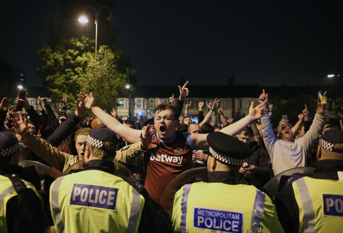 West Ham fans celebrate Tuesday's win over Manchester United outside the Boleyn Ground.