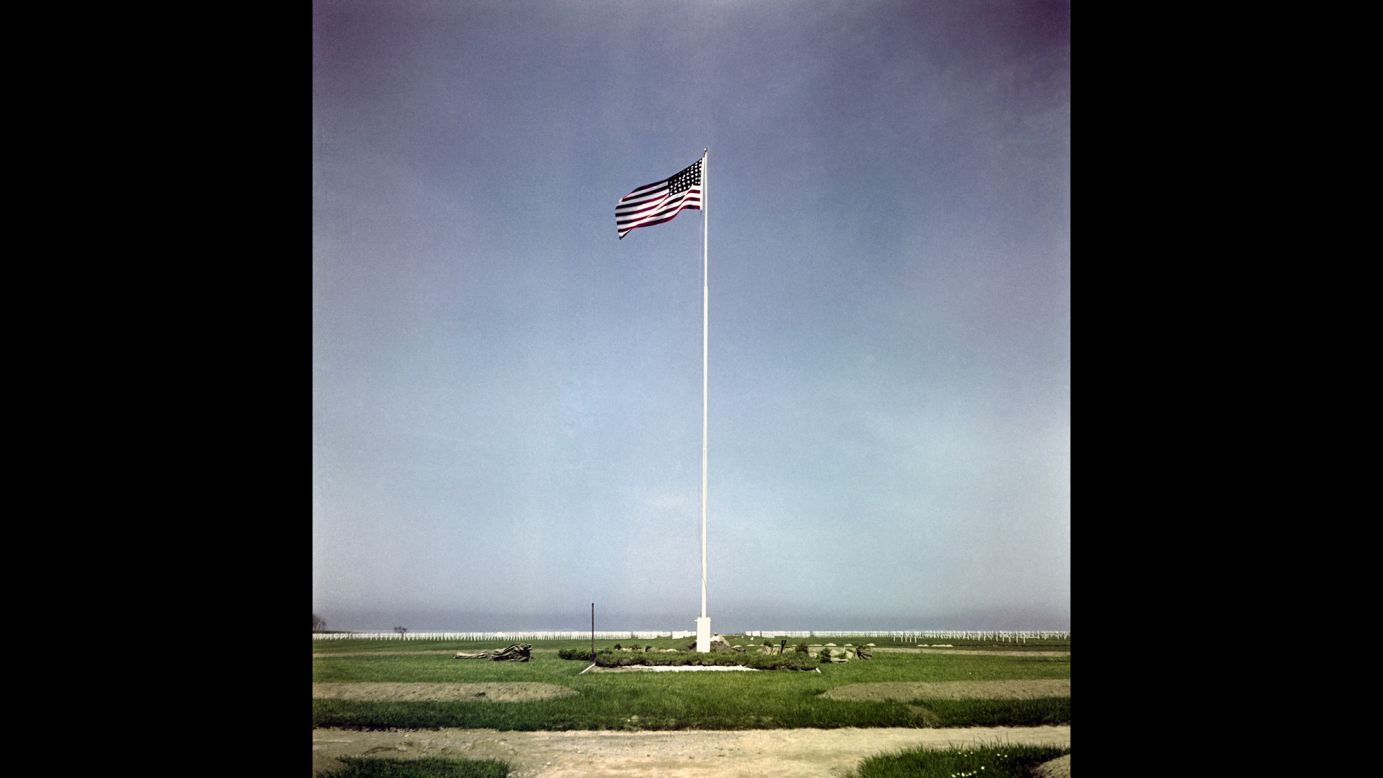 The American flag flies at a U.S. military cemetery on Omaha Beach. More than 150,000 Allied troops -- about half of them Americans -- stormed the beaches of Normandy, France, on <a href="http://www.cnn.com/2013/06/03/world/europe/d-day-fast-facts/" target="_blank">D-Day.</a> The operation was the turning point of World War II.