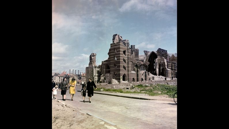 People walk by a damaged building in Nijmegen in 1947.