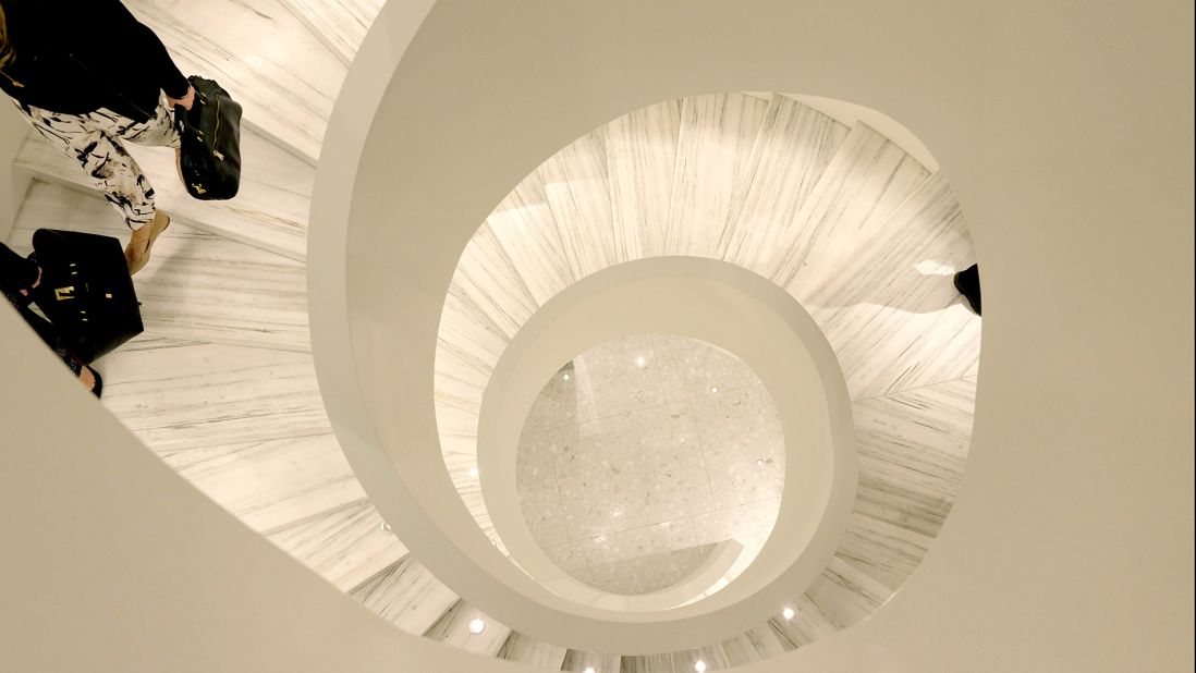 The sleek white spiral staircase is a centerpiece at the new Barneys New York store. Opened in 2016, the 5,388-square-meter venue offers a more intimate shopping experience than Barney's previous NYC store.