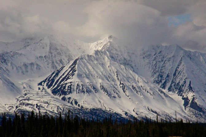 Not long after Whitehorse the highway continues north skirting the towering Wrangell-St. Elias Mountains. These peaks mark the border between Canada and Alaska.