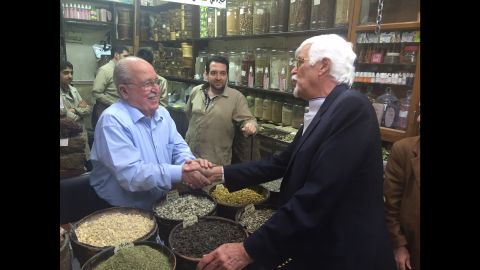  Thomas Webber greets the owner of a shop in Damascus that sells spices and herbal remedies. The same family has owned the shop for 200 years.