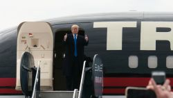 VANDALIA, OH - MARCH 12: Republican Presidential candidate  gives a thumbs up to the crowd walking off his plane at a campaign rally on March 12, 2016 in Vandailia, Ohio. Today was the first rally  after violence broke out in a Trump Rally in Chicago yesterday which canceled the rally. (Photo by Ty Wright/Getty Images)