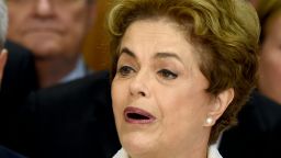 Brazil's suspended President Dilma Rousseff makes a statement at the Planalto Palace in Brasilia on May 12, 2016. Rousseff said Thursday that democracy and the constitution are at stake after she was forced to face an impeachment trial in the Senate and cede power to vice president Michel Temer.